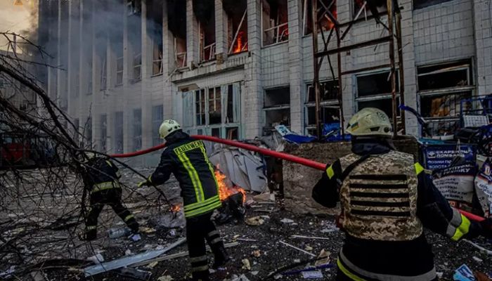 Rescuers work at a site of an industrial building damaged by an airstrike, as Russia's attack on Ukraine continues, in Kyiv, Ukraine, in this handout picture released March 22, 2022. || Reuters Photo: Collected 
