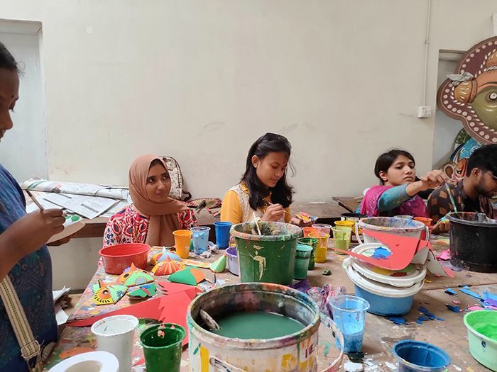 The students said their preparation would continue until April 13. Their faces showed their enthusiasm and excitement while working under the supervision of artist Shishir Bhattacharjee.