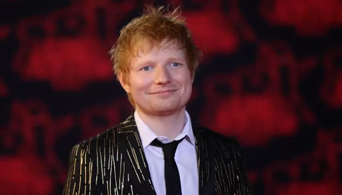 In this file photo taken on November 20, 2021 British singer Edward Christopher Sheeran aka 'Ed Sheeran' poses on the red carpet prior the 23st NRJ Music Awards ceremony at the Palais des Festivals in Cannes, south-eastern France. || AFP Photo