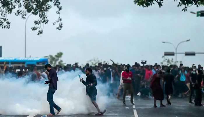 Police use tear gas shells to disperse students taking part in an anti-government protest demanding the resignation of Sri Lanka's President Gotabaya Rajapaksa over the country's crippling economic crisis, in Colombo on May 29, 2022 || AFP Photo