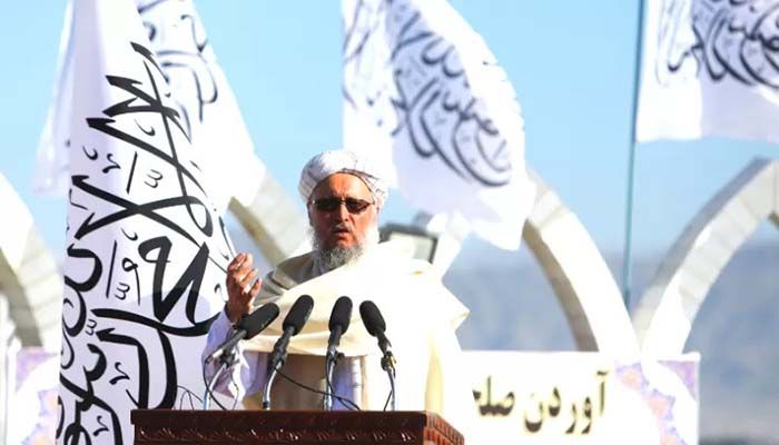 Afghan Deputy Prime Minister Mawlavi Abdul Salam Hanafi speaks during a ceremony to raise the Taliban flag in Kabul, Afghanistan, March 31, 2022 || Reuters Photo: Collected 