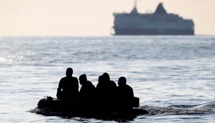 File photo of migrants crossing the English Channel in an inflatable boat near Dover, Britain || Reuters Photo