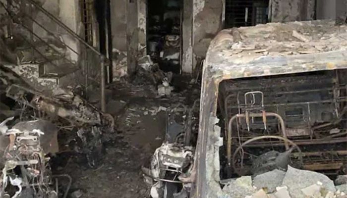 A building and a vehicle lie in ruins after a fire broke out in Indore city in India's Madhya Pradesh on Saturday, May 7, 2022 || Photo: ANI/ Twitter