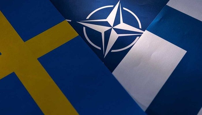 NATO, Swedish and Finnish flags are seen in this illustration taken May 12, 2022 || REUTERS