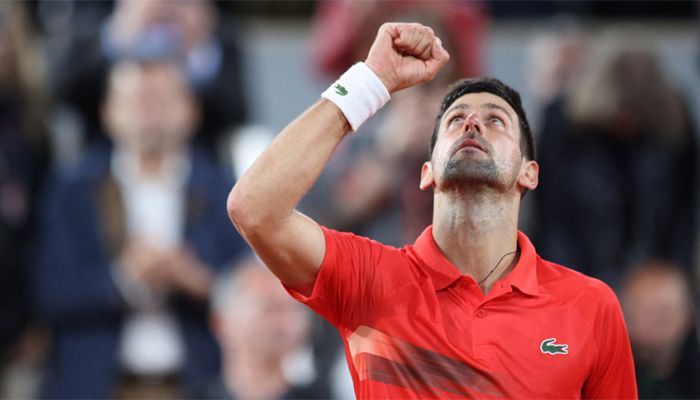 Novak Djokovic celebrates after winning his first-round match against Japan's Yoshihito Nishioka || Photo: REUTERS