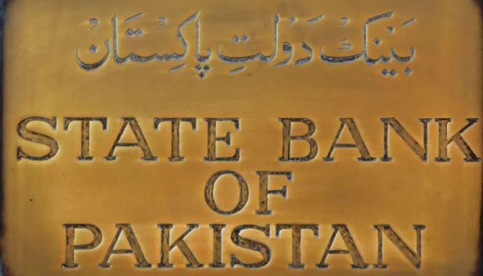 A brass plaque of the State Bank of Pakistan is seen outside of its wall in Karachi, Pakistan on December 5, 2018 || Reuters Photo