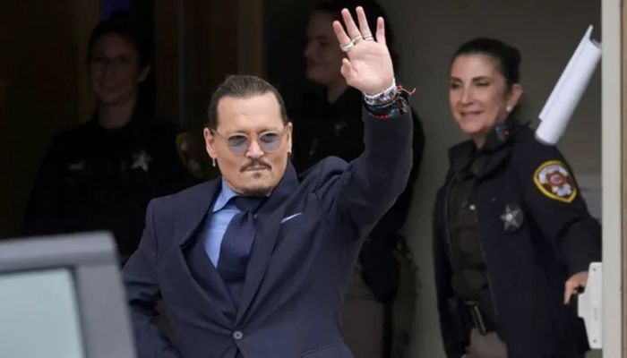 Actor Johnny Depp gestures as he leaves the Fairfax County Circuit Courthouse following his defamation trial against his ex-wife Amber Heard, in Fairfax, Virginia, US on May 27, 2022 || Reuters Photo
