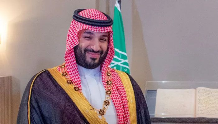Saudi Crown Prince Mohammed bin Salman smiling after receiving al-Hussein bin Ali medal at al-Husseiniya Palace in the capital Amman on June 21, 2022 || AFP Photo