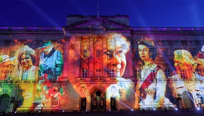 Images of the Queen over the decades was projected on to Buckingham Palace during the show || Photo: Collected 