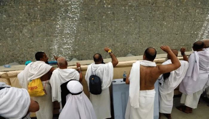 Muslim pilgrims cast stones at a pillar that symbolises Satan, during the annual Hajj pilgrimage in Mina, Saudi Arabia on August 21, 2018 || Reuters Photo