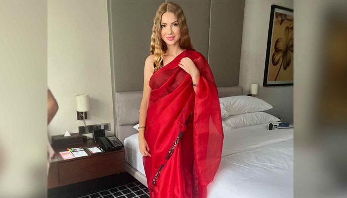 Otilia Posts a Picture of Her in Stunning Crimson Maslin Sari