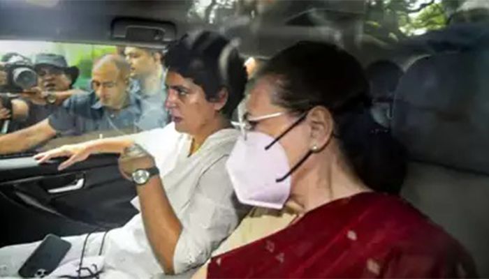 Congress President Sonia Gandhi with party General Secretary Priyanka Gandhi Vadra leaves her residence ahead of appearing before the Enforcement Directorate in connection with the National Herald case || Photo: PTI