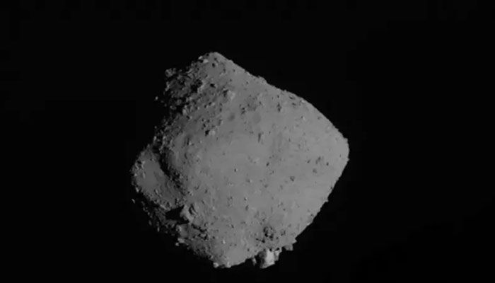 This file handout photograph released by Japan Aerospace Exploration Agency (JAXA) via Jiji Press on November 13, 2019 shows the asteroid Ryugu after Hayabusa2 departed its orbit around a distant asteroid and head for Earth. || AFP Photo