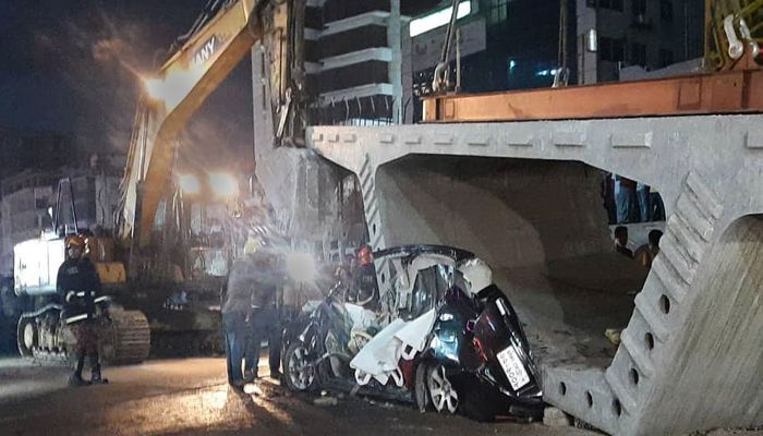 At least 5 people in a car were crushed to death and injured another two after a segment of a viaduct of the Bus Rapid Transit (BRT) project fell on the vehicle in Uttara area this afternoon || Photo: Collected 