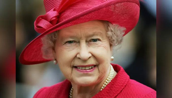 In this photo taken on April 21, 2006 Britain's Queen Elizabeth II smiles as she walks along Windsor High Street as part of her 80th birthday celebrations || AFP Photo