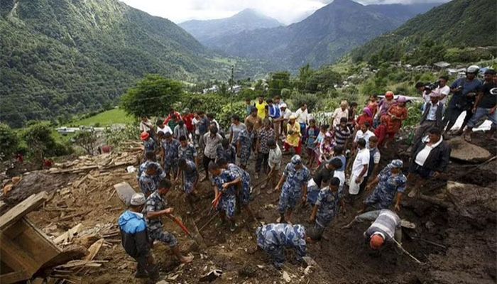 Rescue team members search for landslide victims at Lumle village in Kaski district July 30, 2015. || REUTERS Photo