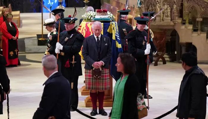 Tears for Queen Elizabeth II As Coffin Rests in Scotland 