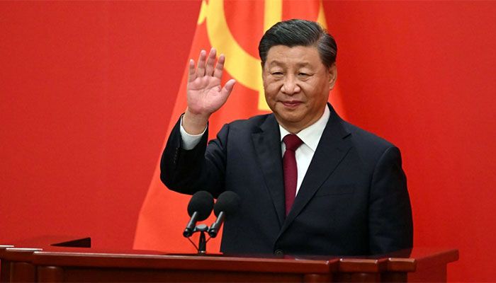 China's President Xi Jinping waves after introducing the members of the Chinese Communist Party's new Politburo Standing Committee, the nation's top decision-making body, in the Great Hall of the People in Beijing on October 23, 2022 ||  AFP Photo: Collected 