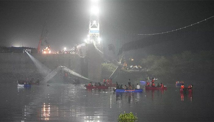 Nine Arrested after Bridge Collapses in India, Killing 134