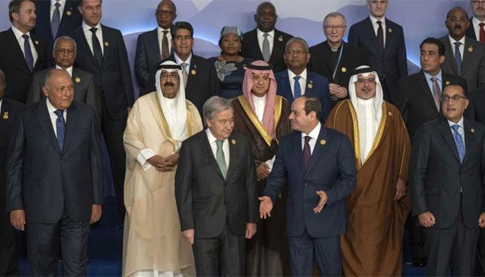 Egyptian President Abdel Fattah El-Sisi, center right, and United Nations Secretary-General Antonio Guterres, center left, leave after a group photo at the COP27 U.N. Climate Summit, in Sharm el-Sheikh, Egypt, Monday, Nov. 7, 2022.  || AP Photo: Collected  
