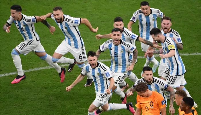 Argentina players celebrate after they won on penalty shoot-out during the Qatar 2022 World Cup quarter-final football match between The Netherlands and Argentina at Lusail Stadium, north of Doha, on December 9, 2022 || AFP Photo