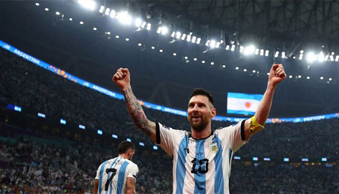 Argentina's Lionel Messi celebrates their third goal scored by Julian Alvarez. || Photo: REUTERS