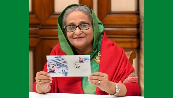 Prime Minister Sheikh Hasina unveils commemorative postage stamp of Tk 10 at a ceremony at her official residence Ganabhaban on Friday || PID Photo