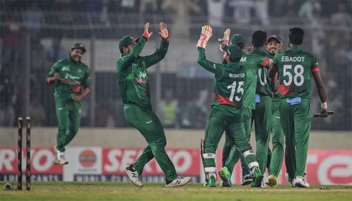 Bangladesh's players celebrate after their win in the second one-day international (ODI) cricket match between Bangladesh and India at the Sher-e-Bangla National Cricket Stadium in Dhaka on December 7, 2022 || AFP Photo