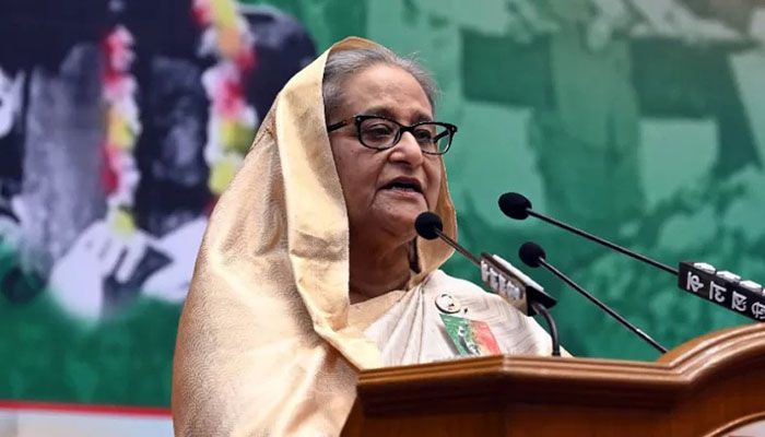 Prime Minister and Awami League President Sheikh Hasina speaks at a discussion meeting organised by the AL at the Bangabandhu International Conference Centre (BICC) in Dhaka on Tuesday || Photo: Collected 