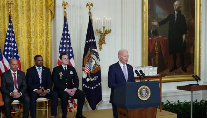 US President Joe Biden speaks on the second anniversary of the January 6, 2021 attack on the US Capitol, during a ceremony in the East Room of the White House in Washington, DC, on January 6, 2023 || AFP Photo: Collected   