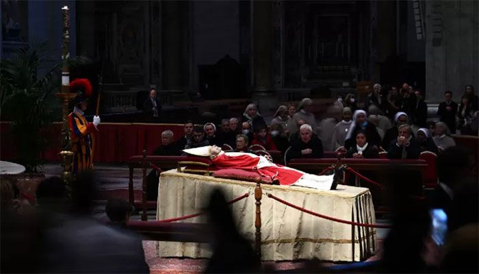 The body of Pope Emeritus Benedict XVI lays in state at St. Peter's Basilica in the Vatican, on January 2, 2023. || AFP Photo: Collected  