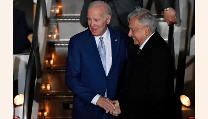 US President Joe Biden (L) is welcomed by his Mexican counterpart Andres Manuel Lopez Obrador upon landing at Felipe Angeles International Airport in Zumpango de Ocampo, north of Mexico City on January 8, 2023. || AFP Photo: Collected 