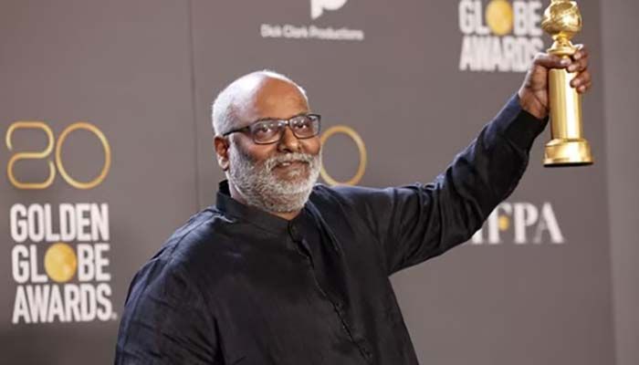 MM Keeravani poses with his award for Best Song in a Motion Picture for "Naatu Naatu" for film "RRR" at the 80th Annual Golden Globe Awards in Beverly Hills, California, US, Jan 10, 2023 || Photo: REUTERS