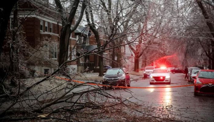 Tree branches and power lines are seen after they fell in Monkland Village after freezing rain hit parts of Quebec and Ontario in Montreal, Canada, on April 5, 2023 || AFP Photo 