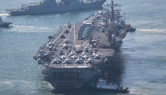 The U.S. Navy's nuclear-powered aircraft carrier USS Nimitz departs a naval base in Busan, South Korea, Sunday, April 2, 2023. || Photo: AP
