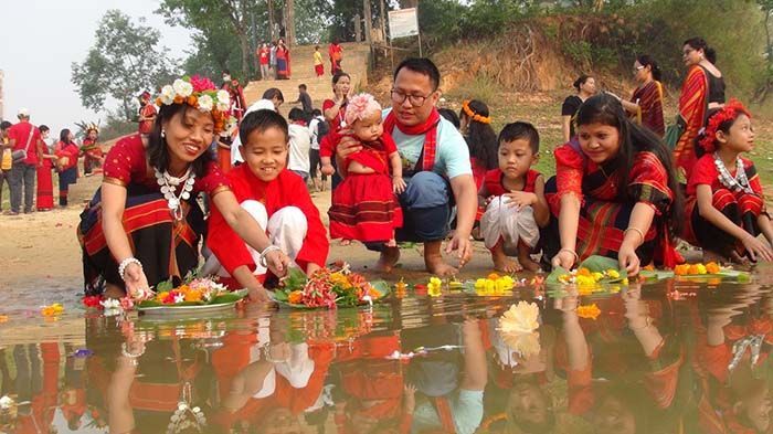 The celebration began through young women of Chakma-Tanchangya immersing flowers in Chengi River and Shankha River in the town's Khabangpuria area by the local Tripura community.