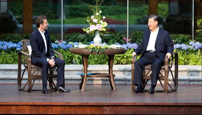 Xi, Macron Hold Informal Meeting in China 