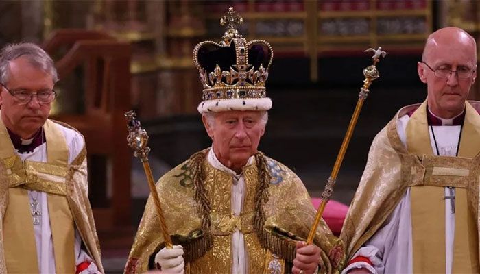 Britain's King Charles III with the St Edward's Crown on his head attends the Coronation Ceremony inside Westminster Abbey in central London on May 6, 2023 || AFP Photo