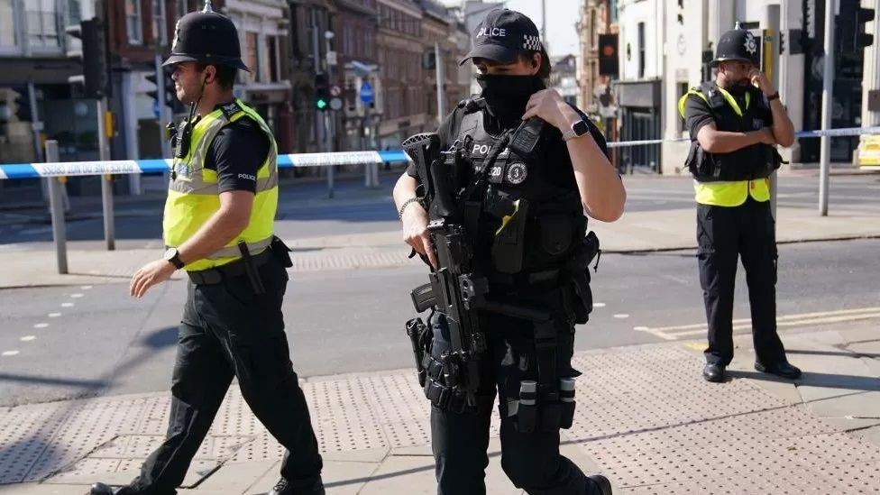 Armed police officers were seen across the city throughout the day.