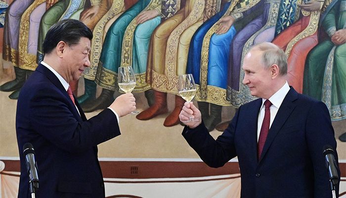 Russian President Vladimir Putin and China’s President Xi Jinping make a toast during a reception following their talks at the Kremlin in Moscow on March 21, 2023 || Photo: AFP