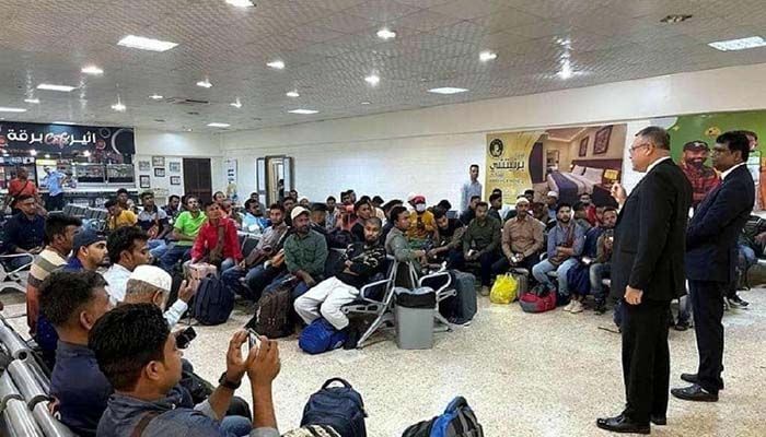 The Bangladeshi ambassador to Libya bid farewell to the migrants at the Benina airport in Benghazi || Photo: Collected