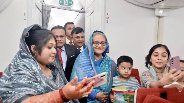 On Tuesday midnight, journalist Yasin Kabir Jai posted a few pictures on his Facebook. It can be seen that the Prime Minister walks and talks with every passenger of the plane.