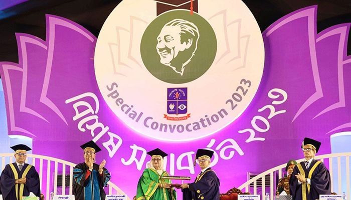 On behalf of the university, the president of the special convocation Professor Dr Md. Akhtaruzzaman handed over the degree of Bangabandhu to Bangabandhu's daughter and convocation speaker Prime Minister Sheikh Hasina || Photo: Collected