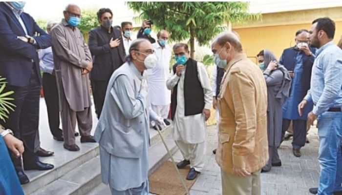 PPPP President Asif Ali Zardari Is Welcoming PML-N President Shahbaz Sharif On His Arrival at Bilawal House in Karachi. Photo: Collecetd