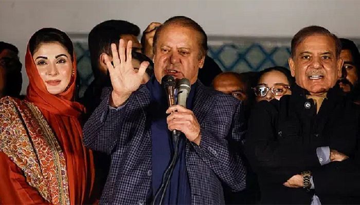 Pakistan Muslim League-Nawaz (PML-N) leader Nawaz Sharif addressed supporters at the party office in Lahore on Friday after the election results were announced. Next to him (right) is younger brother and party president Shahbaz Sharif || Photo: Reuters