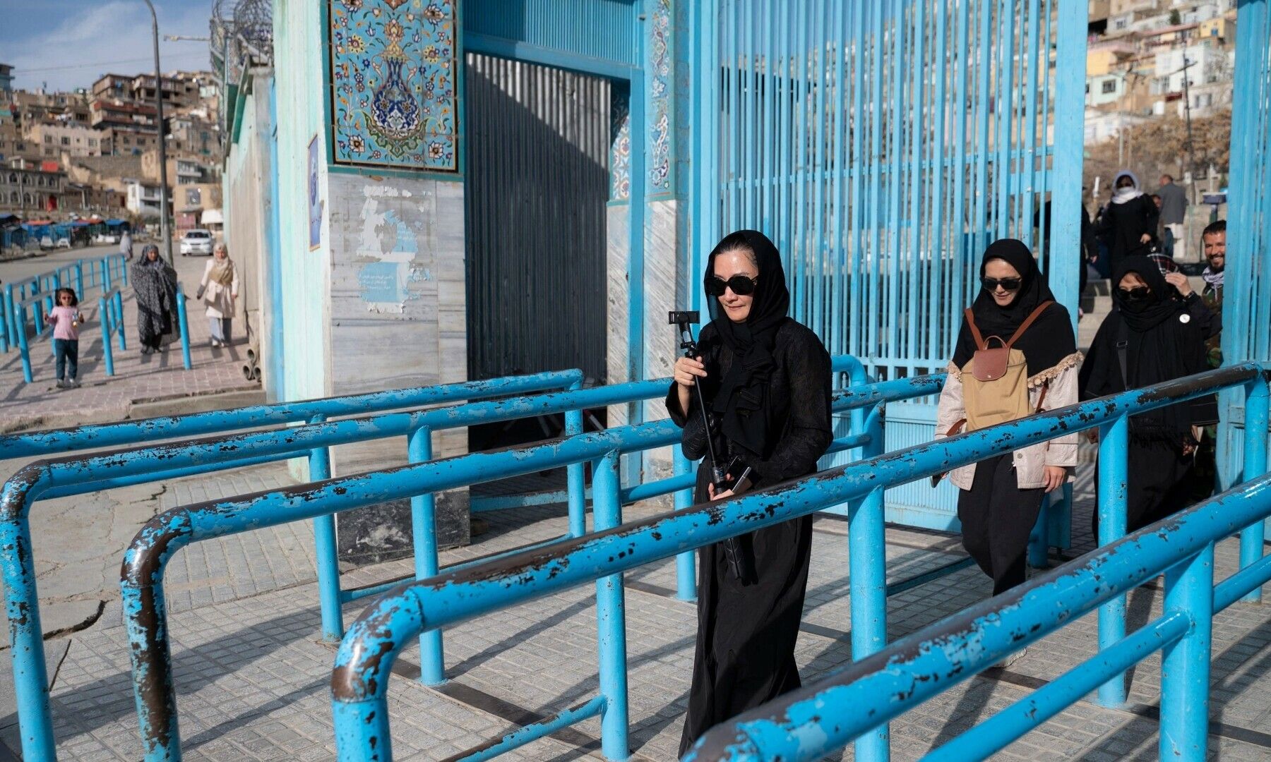 In this picture taken on March 25, Thai tourists leave after visiting the Kart-e-Sakhi Shrine in Kabul. Photo: AFP