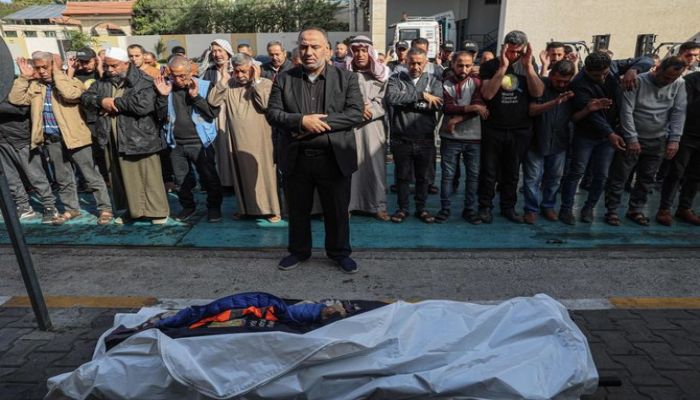 Relatives And Friends Pray By The Body Of Saif Abu Taha In His Funeral, A staff Member Of The US-Based Aid Group World Central Kitchen Who Was Killed As Israeli Strikes On Rafah, April 2, 2024. Photo: AFP