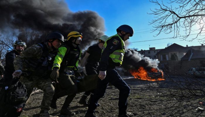 Emergency Workers Carry An Injured Woman At A Site Of A Russian Missile Strike In Zaporizhzhia, Ukraine, on April 5, 2024. Photo: Reuters