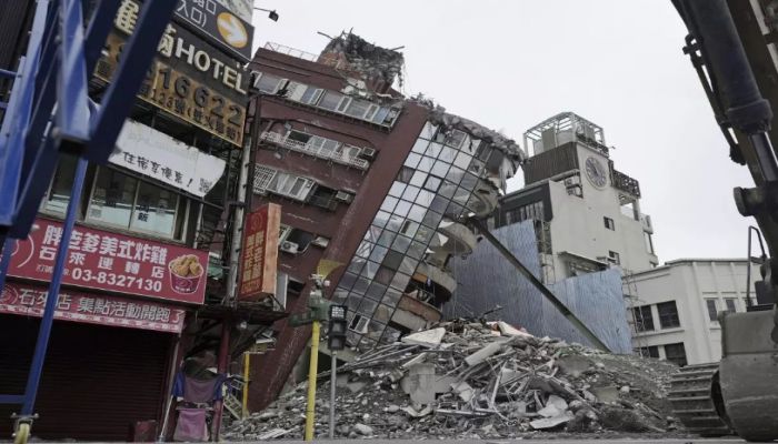 Demolition Work Is Underway At A Building Collapsed By A Powerful Earthquake In Hualien City, Taiwan, On Saturday. Photo: AP