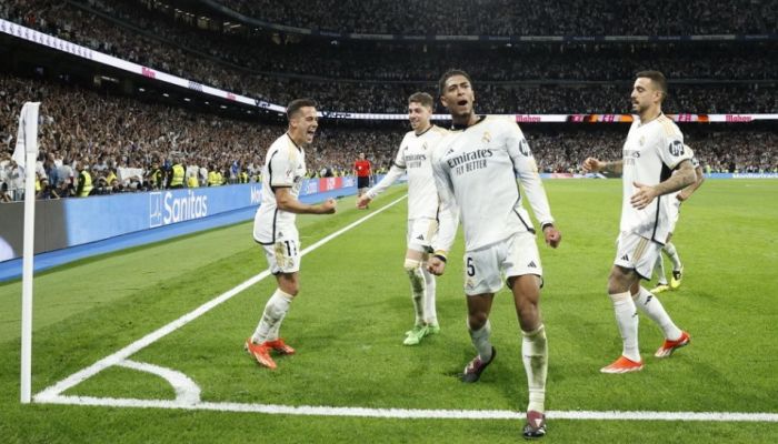 Real Madrid's English Midfielder #5 Jude Bellingham Celebrates Scoring His Team's Third Goal During The Spanish League Football Match Between Real Madrid CF And FC Barcelona At The Santiago Bernabeu Stadium, Madrid On April 21, 2024. Photo: AFP
